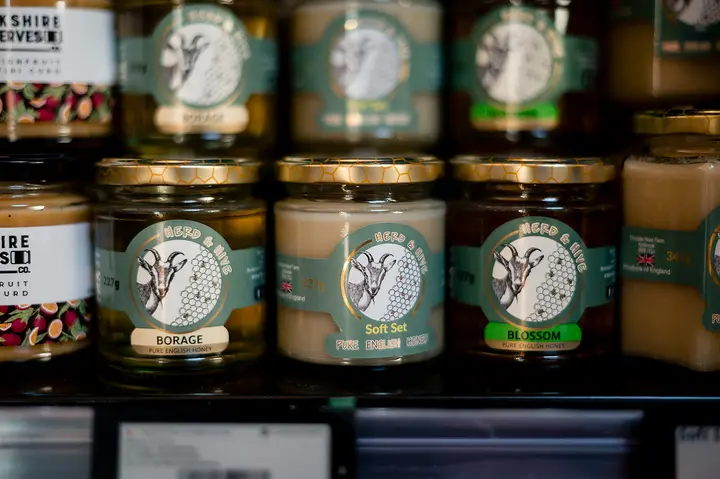 Jars of local honey on a shelf
